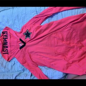 I’m selling this pink cowboys jacket that has a hood